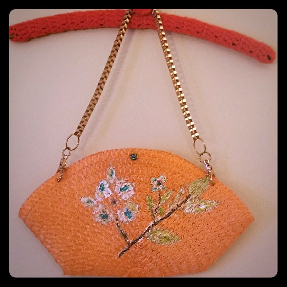 Orange bag with chain handle